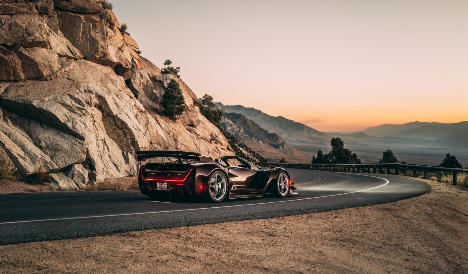 21C Spyder front three-quarter on a canyon road